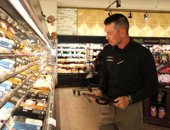 One-Stop staff conducting refrigeration assessment